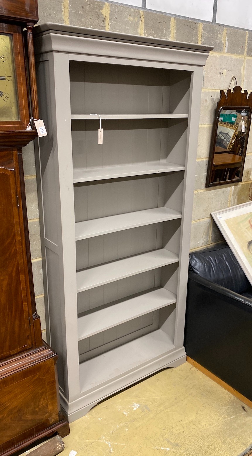 A modern grey painted open bookcase with adjustable shelves, width 95cms, depth 30cms, height 201cms.
